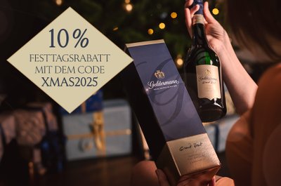 Weihnachtsgeschenk-Ideen: Störer mit 10% Festtags-Rabatt, exemplarisch dazu ein Bild einer Flasche Geldermann Grand Brut mit Geschenkverpackung