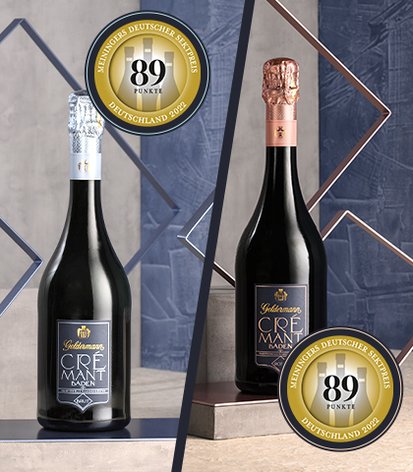 Zwei Flaschen Crémant stehen auf einem eleganten Tisch, umgeben von geometrischen Formen und Auszeichnungen für Qualität.